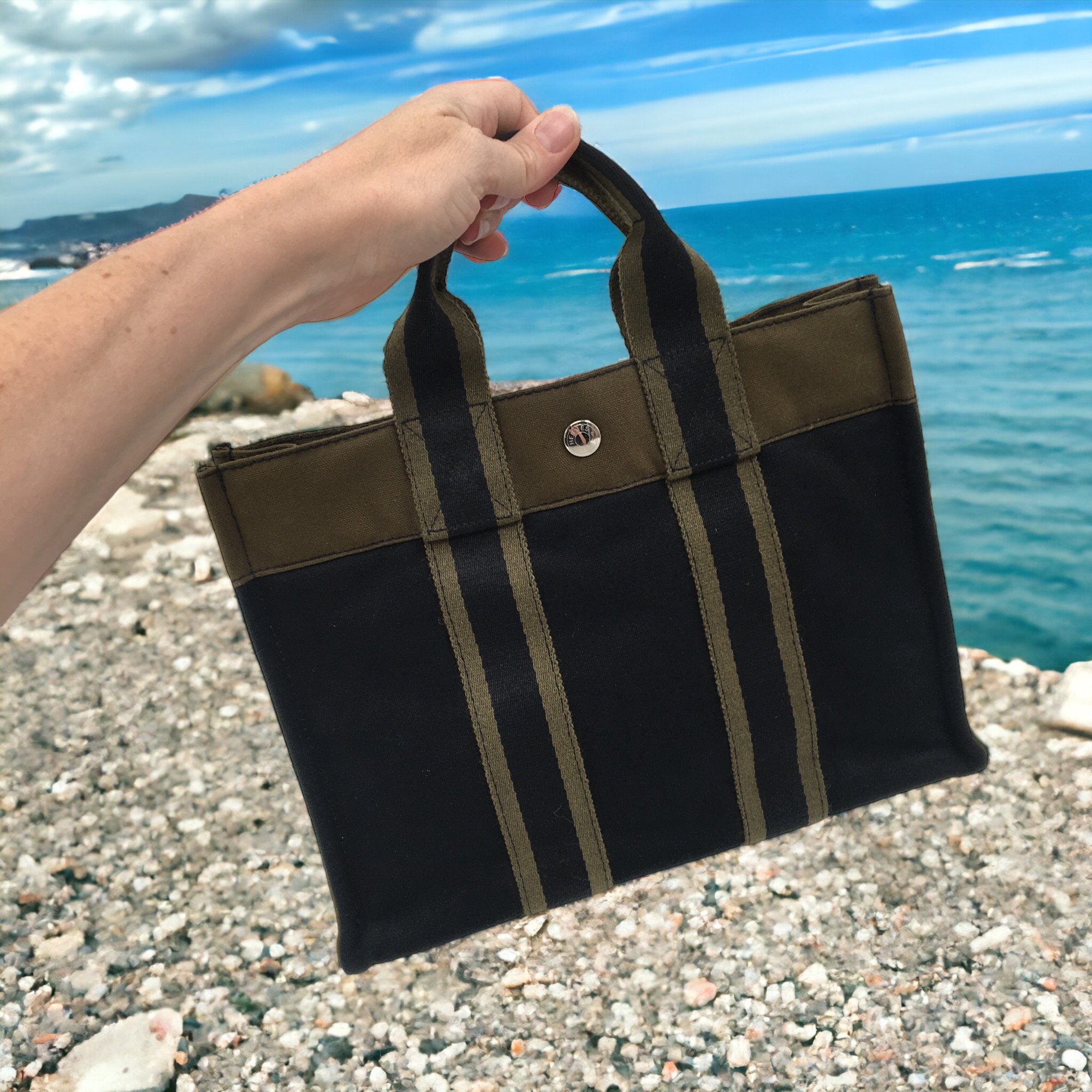 Hermès Herline PM canvas tote bag in black and khaki canvas - DOWNTOWN  UPTOWN Genève